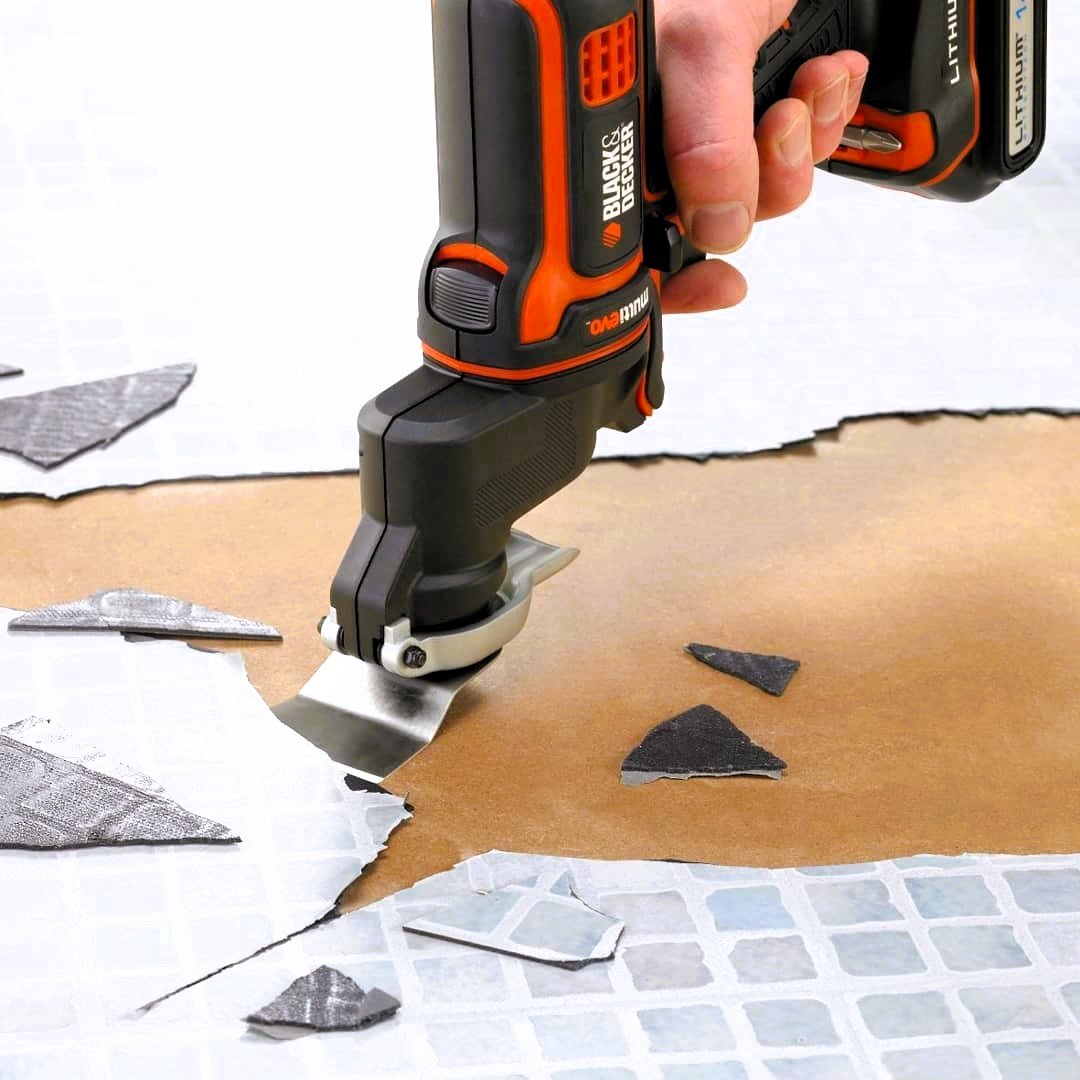 Scraping tiles using Oscillating Multi tool 786