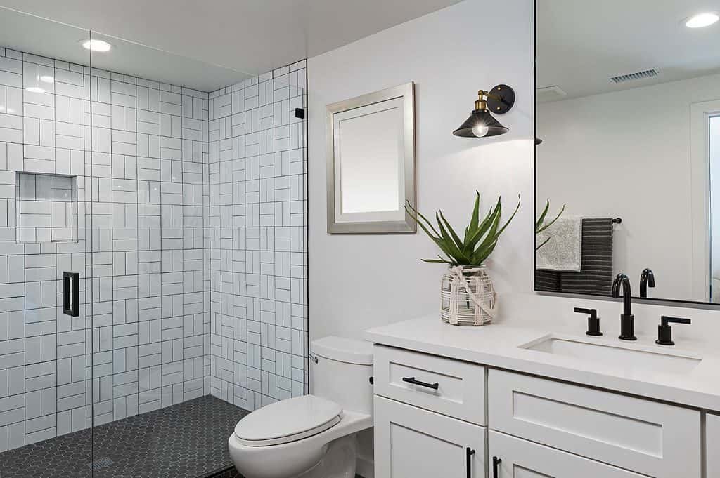 Modern looking bathroom with white tiles